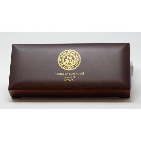 Runde Münze mit geprägtem Tiger-Motiv, Brilliant Uncirculated, feine Oberflächenstruktur.