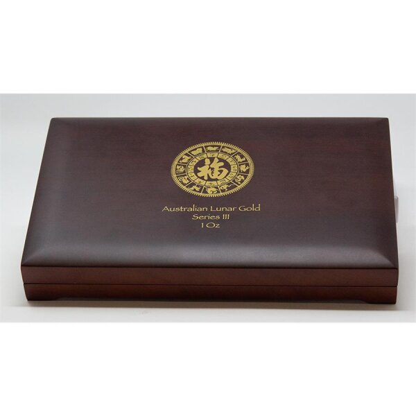 Runde Münze mit geprägtem Tiger-Motiv, Brilliant Uncirculated, feine Oberflächenstruktur.