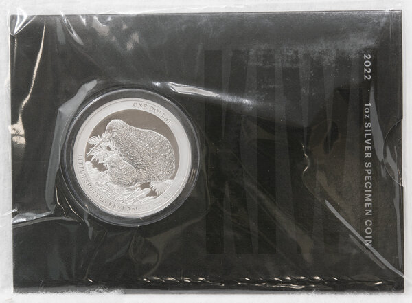 Runde Münze mit geprägtem Adler-Motiv, Brilliant Uncirculated, feine Oberflächenstruktur.