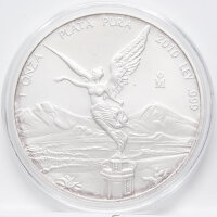 Runde Münze mit geprägtem Adler-Motiv,...