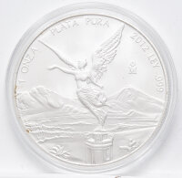 Runde Münze mit geprägtem Adler-Motiv,...