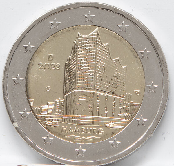 Runde Münze mit geprägtem Portraitprofil-Motiv, Brilliant Uncirculated, feine Oberflächenstruktur.