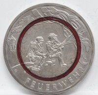 Runde Münze mit geprägtem Portraitprofil-Motiv,...