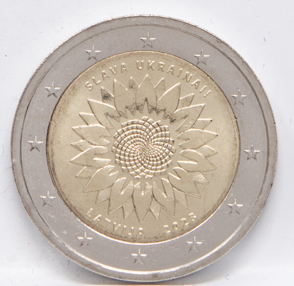 Runde Münze mit geprägtem Portraitprofil-Motiv, Brilliant Uncirculated, feine Oberflächenstruktur.