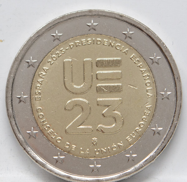 Runde Münze mit geprägtem Portraitprofil-Motiv, Brilliant Uncirculated, feine Oberflächenstruktur.