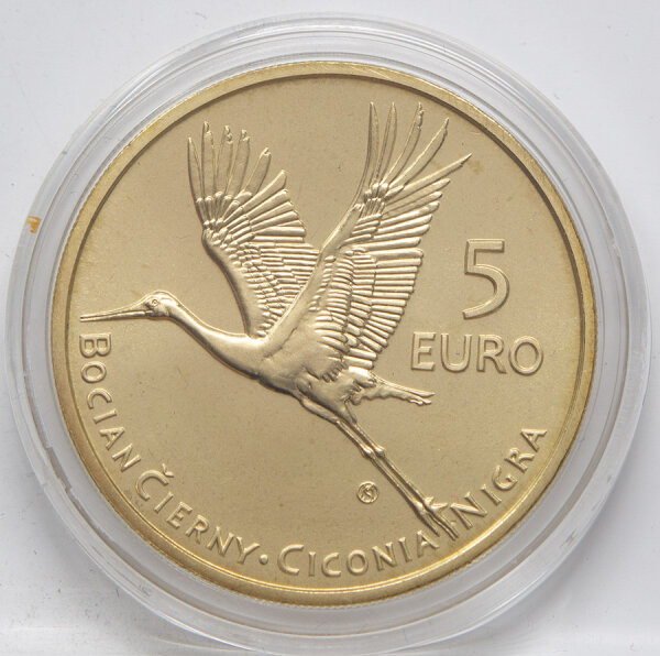 Runde Münze mit geprägtem Portraitprofil-Motiv, Brilliant Uncirculated, feine Oberflächenstruktur.