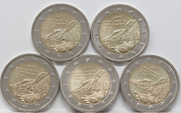 Runde Münze mit geprägtem Portraitprofil-Motiv, Brilliant Uncirculated, feine Oberflächenstruktur.