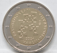 Runde Münze mit geprägtem Löwe-Motiv,...