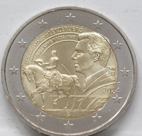 Runde Münze mit geprägtem Portraitprofil-Motiv, Brilliant Uncirculated, feine Oberflächenstruktur.