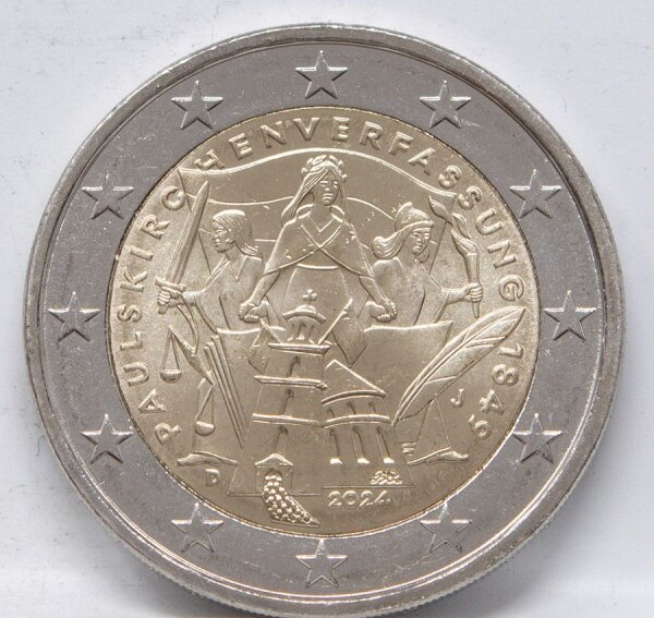 Runde Münze mit geprägtem Portraitprofil-Motiv, Brilliant Uncirculated, feine Oberflächenstruktur.