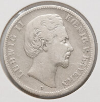 Die Rückseite der Münze zeigt den klassischen...