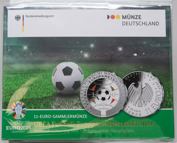 Runde Münze mit geprägtem Portraitprofil-Motiv, Brilliant Uncirculated, feine Oberflächenstruktur.