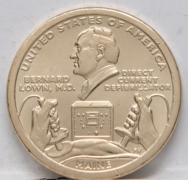 Runde Münze mit geprägtem Portraitprofil-Motiv, Brilliant Uncirculated, feine Oberflächenstruktur.