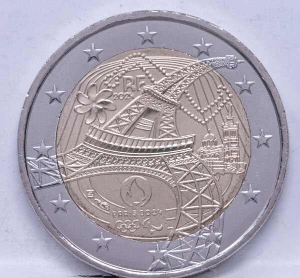 Runde Münze mit geprägtem Portraitprofil-Motiv, Brilliant Uncirculated, feine Oberflächenstruktur.