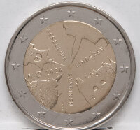 Runde Münze mit geprägtem Löwe-Motiv,...