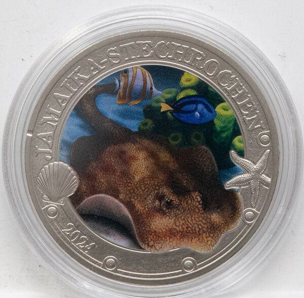 Runde Münze mit geprägtem Portraitprofil-Motiv, Brilliant Uncirculated, feine Oberflächenstruktur.