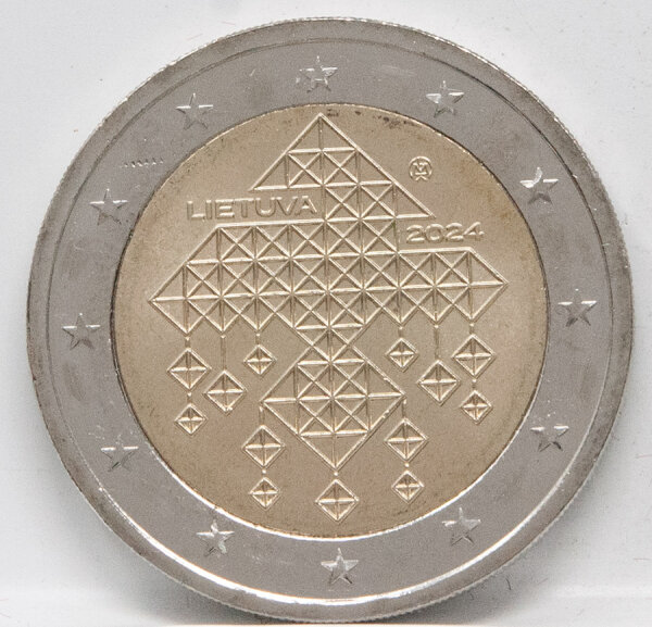 Runde Münze mit geprägtem Portraitprofil-Motiv, Brilliant Uncirculated, feine Oberflächenstruktur.