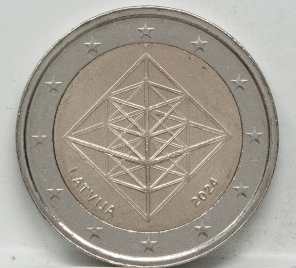 Runde Münze mit geprägtem Portraitprofil-Motiv, Brilliant Uncirculated, feine Oberflächenstruktur.