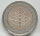 Runde Münze mit geprägtem Portraitprofil-Motiv, Brilliant Uncirculated, feine Oberflächenstruktur.