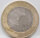 Runde Münze mit geprägtem Portraitprofil-Motiv, Brilliant Uncirculated, feine Oberflächenstruktur.