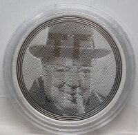 Runde Münze mit geprägtem Adler-Motiv,...