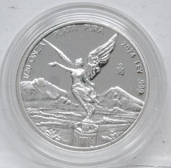 Runde Münze mit geprägtem Segelfisch-Motiv, Brilliant Uncirculated, feine Oberflächenstruktur.