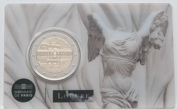 Runde Münze mit geprägtem Portraitprofil-Motiv, Brilliant Uncirculated, feine Oberflächenstruktur.