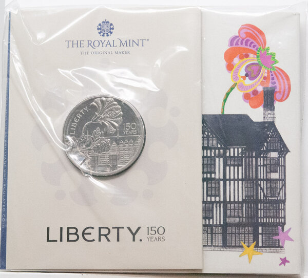 Runde Münze mit geprägtem Portraitprofil-Motiv, Brilliant Uncirculated, feine Oberflächenstruktur.