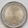 Runde Münze mit geprägtem Portraitprofil-Motiv, Brilliant Uncirculated, feine Oberflächenstruktur.