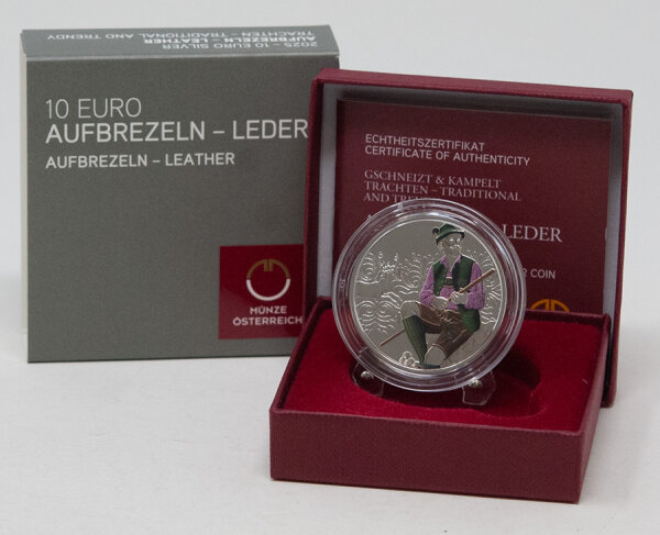 Runde Münze mit geprägtem Portraitprofil-Motiv, Brilliant Uncirculated, feine Oberflächenstruktur.