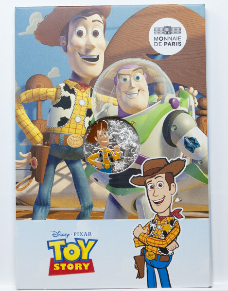 Frankreich 10 Euro „Toy Story“ 2025 Silbermünze im farbigen Monnaie-de-Paris-Blister mit Woody und Buzz Lightyear Motiv.