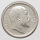 Nahaufnahme einer historischen indischen 1-Rupee-Silbermünze aus dem Jahr 1910. Das Bild zeigt die Vorderseite (Avers) mit dem Porträt von König Edward VII. im Profil nach rechts sowie der Umschrift EDWARD VII KING & EMPEROR.