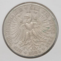 Rückseite des Silbertalers von 1865. Gezeigt wird...