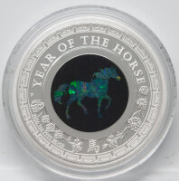 Vorderseite der 1 oz Silber Lunar Opal Münze 2026. Das zentrale Opal-Inlay zeigt die schimmernde Silhouette eines Pferdes, umgeben von einem filigran geprägten Silberrand.