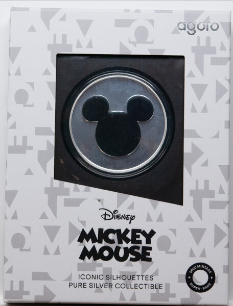 Detaillierte Silhouette-Prägung von Mickey Mouse in poliertem Silber.