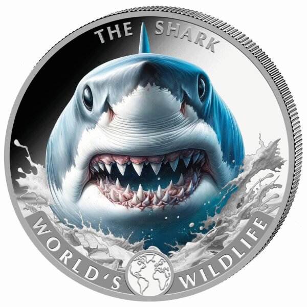 Zentrales Motiv eines Hais in realistischer Farbgebung (Blau- und Grautöne), der aus azurblauem Wasser emporsteigt. Die Gischt ist in glänzendem Silber gehalten, umrahmt von den Schriftzügen THE SHARK und WORLDS WILDLIFE.
