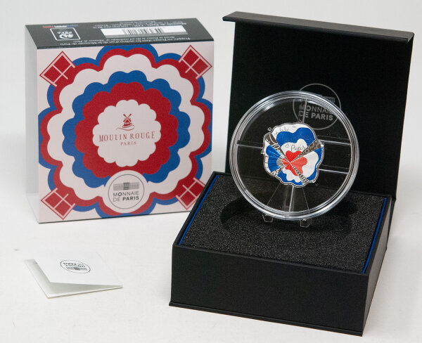 Die Vorderseite zeigt die rot colorierte Windmühle des Moulin Rouge in ihrer ikonischen Form, ergänzt durch architektonische Details des Cabarets.