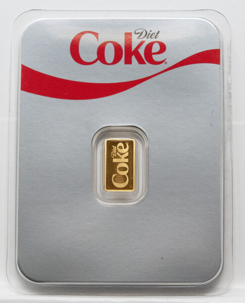 Vorderseite des PAMP 1 g Feingoldbarrens Diet Coke im offiziell lizenzierten Sammler-Blister.