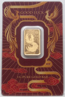 Vorderseite des PAMP 5 g Feingoldbarrens Good Luck Phoenix im farbenfrohen CertiPAMP-Blister.