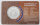 Rückseite der Wolf-Coincard mit dem Wappen der Republik Kamerun und Spezifikationen.